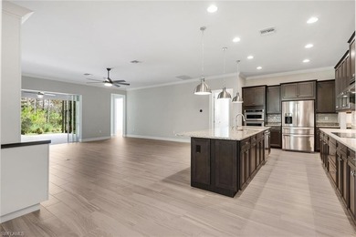 Welcome to 3837 Helmsman Drive--a 4 bedroom + den, 3-car garage on Vanderbilt Country Club in Florida - for sale on GolfHomes.com, golf home, golf lot