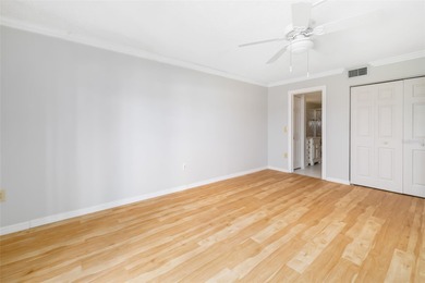 Step inside this beautifully remodeled 3rd-floor, 2-bedroom on IMG Academies Golf and Country Club in Florida - for sale on GolfHomes.com, golf home, golf lot