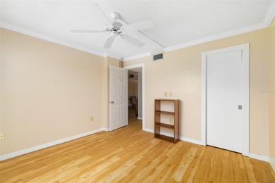 Step inside this beautifully remodeled 3rd-floor, 2-bedroom on IMG Academies Golf and Country Club in Florida - for sale on GolfHomes.com, golf home, golf lot