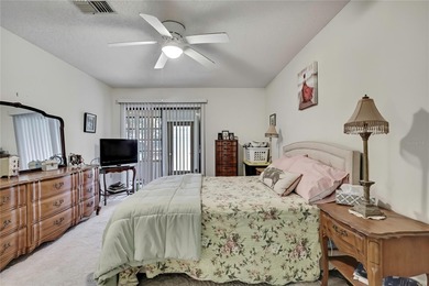 Beautifully maintained 2-bedroom, 2-bath villa featuring tile on Timber Pines Golf Course in Florida - for sale on GolfHomes.com, golf home, golf lot