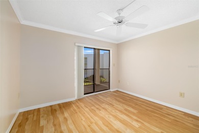 Step inside this beautifully remodeled 3rd-floor, 2-bedroom on IMG Academies Golf and Country Club in Florida - for sale on GolfHomes.com, golf home, golf lot