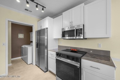 Welcome to your dream GROUND-FLOOR CORNER condo at The Greens! on St. Augustine Shores Golf Club in Florida - for sale on GolfHomes.com, golf home, golf lot