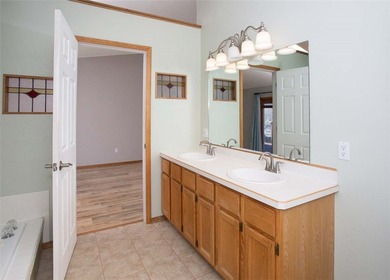 Tucked into Briarwood and just minutes from the golf course on The Briarwood in Montana - for sale on GolfHomes.com, golf home, golf lot