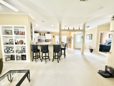 Located in the prestigious Crane Lakes Golf and Country Club on Crane Lakes Golf and Country Club in Florida - for sale on GolfHomes.com, golf home, golf lot