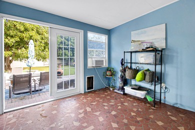 Welcome to this inviting 2 bedroom, 1 bathroom home in the heart on Lake Worth Municipal Golf Course in Florida - for sale on GolfHomes.com, golf home, golf lot