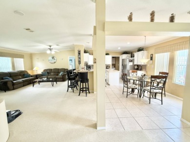 Located in the prestigious Crane Lakes Golf and Country Club on Crane Lakes Golf and Country Club in Florida - for sale on GolfHomes.com, golf home, golf lot