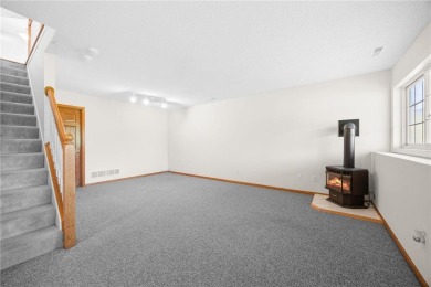 Enjoy a carefree lifestyle in this beautiful end-unit townhome on Crystal Lake Golf Course in Minnesota - for sale on GolfHomes.com, golf home, golf lot