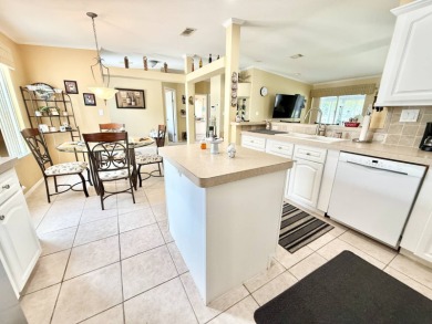 Located in the prestigious Crane Lakes Golf and Country Club on Crane Lakes Golf and Country Club in Florida - for sale on GolfHomes.com, golf home, golf lot