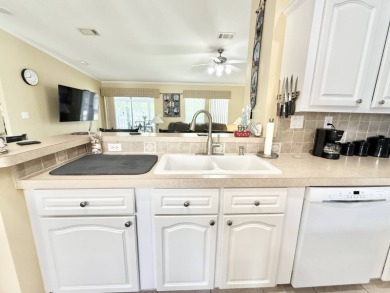 Located in the prestigious Crane Lakes Golf and Country Club on Crane Lakes Golf and Country Club in Florida - for sale on GolfHomes.com, golf home, golf lot