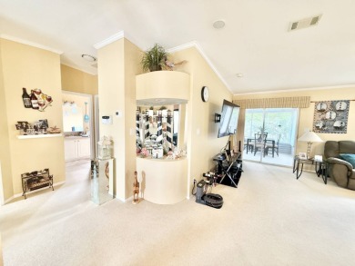 Located in the prestigious Crane Lakes Golf and Country Club on Crane Lakes Golf and Country Club in Florida - for sale on GolfHomes.com, golf home, golf lot