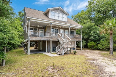 Sought after Davis Canal Front Property featuring boat lift on Founders Club At St. James Plantation in North Carolina - for sale on GolfHomes.com, golf home, golf lot