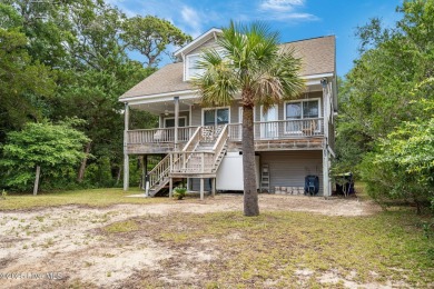 Sought after Davis Canal Front Property featuring boat lift on Founders Club At St. James Plantation in North Carolina - for sale on GolfHomes.com, golf home, golf lot