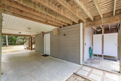Sought after Davis Canal Front Property featuring boat lift on Founders Club At St. James Plantation in North Carolina - for sale on GolfHomes.com, golf home, golf lot