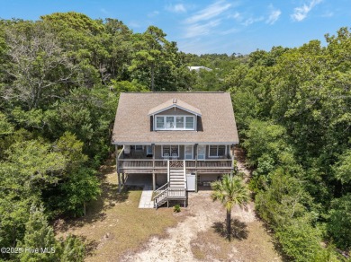 Sought after Davis Canal Front Property featuring boat lift on Founders Club At St. James Plantation in North Carolina - for sale on GolfHomes.com, golf home, golf lot