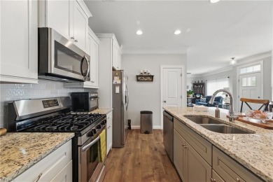This 3 bed, 2.5 bath, luxury End Unit Townhouse condo w/ two car on Riverfront Golf Club in Virginia - for sale on GolfHomes.com, golf home, golf lot