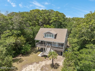 Sought after Davis Canal Front Property featuring boat lift on Founders Club At St. James Plantation in North Carolina - for sale on GolfHomes.com, golf home, golf lot