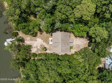 Sought after Davis Canal Front Property featuring boat lift on Founders Club At St. James Plantation in North Carolina - for sale on GolfHomes.com, golf home, golf lot