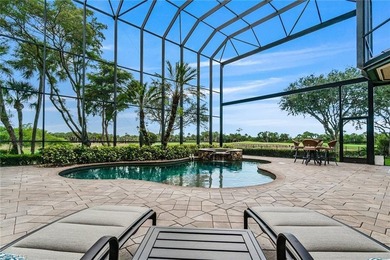 Prepare to be captivated by this extraordinary estate in Shadow on Shadow Wood Preserve in Florida - for sale on GolfHomes.com, golf home, golf lot