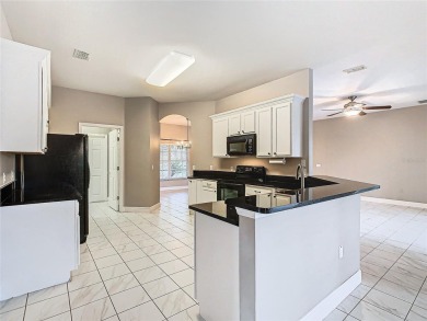 HUGE Price REDUCTION! Great UPDATED CARNEGIE model on a corner on Stonegate Golf Club in Florida - for sale on GolfHomes.com, golf home, golf lot