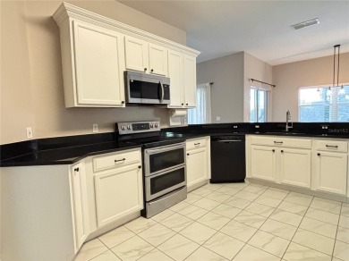 HUGE Price REDUCTION! Great UPDATED CARNEGIE model on a corner on Stonegate Golf Club in Florida - for sale on GolfHomes.com, golf home, golf lot