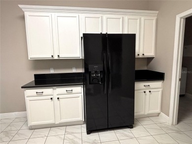 HUGE Price REDUCTION! Great UPDATED CARNEGIE model on a corner on Stonegate Golf Club in Florida - for sale on GolfHomes.com, golf home, golf lot