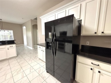 HUGE Price REDUCTION! Great UPDATED CARNEGIE model on a corner on Stonegate Golf Club in Florida - for sale on GolfHomes.com, golf home, golf lot