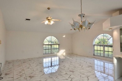 What a find in this neighborhood of picturesque homes!  Tucked on Deep Creek Golf Club in Florida - for sale on GolfHomes.com, golf home, golf lot