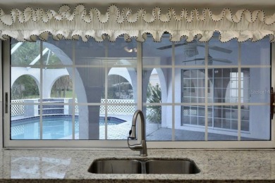 What a find in this neighborhood of picturesque homes!  Tucked on Deep Creek Golf Club in Florida - for sale on GolfHomes.com, golf home, golf lot