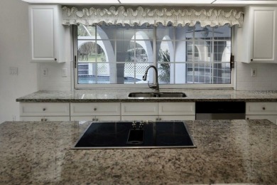 What a find in this neighborhood of picturesque homes!  Tucked on Deep Creek Golf Club in Florida - for sale on GolfHomes.com, golf home, golf lot