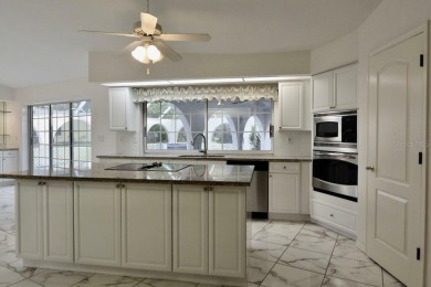 What a find in this neighborhood of picturesque homes!  Tucked on Deep Creek Golf Club in Florida - for sale on GolfHomes.com, golf home, golf lot