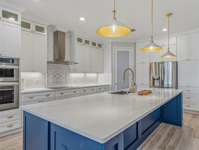 This beautiful home at 1788 Hagen Court in Naples, Florida on Valencia Golf and Country Club in Florida - for sale on GolfHomes.com, golf home, golf lot