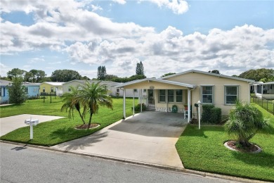 RARE OPPORTUNITY to own this gently used home on TWO LOTS on Barefoot Bay Golf Course in Florida - for sale on GolfHomes.com, golf home, golf lot