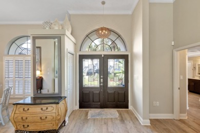 Tucked behind the private gates of the prestigious Emerald Bay on Emerald Bay Golf Club in Florida - for sale on GolfHomes.com, golf home, golf lot