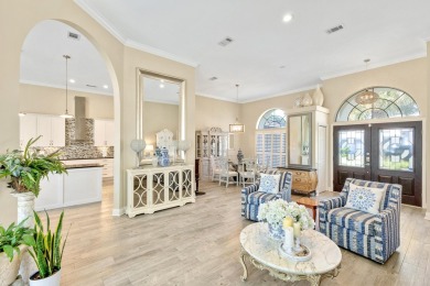 Tucked behind the private gates of the prestigious Emerald Bay on Emerald Bay Golf Club in Florida - for sale on GolfHomes.com, golf home, golf lot