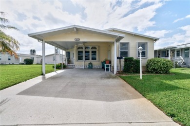 RARE OPPORTUNITY to own this gently used home on TWO LOTS on Barefoot Bay Golf Course in Florida - for sale on GolfHomes.com, golf home, golf lot