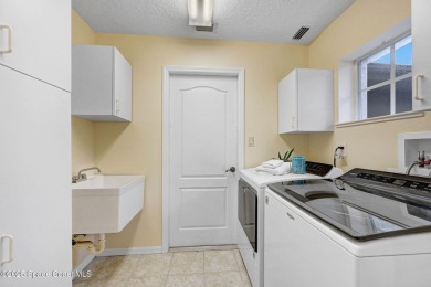 **VIERA EAST GOLF CLUB- Woodhall**  SINGLE STORY One Level Home on Viera East Golf Club in Florida - for sale on GolfHomes.com, golf home, golf lot