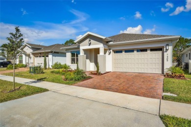 This impressive one-story home is located in the Enclave at on Harmony Golf Preserve in Florida - for sale on GolfHomes.com, golf home, golf lot