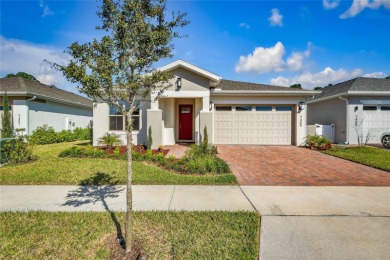 This impressive one-story home is located in the Enclave at on Harmony Golf Preserve in Florida - for sale on GolfHomes.com, golf home, golf lot