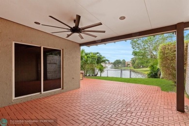 Spectacular LAKE VIEWS from this 4 bedroom 2.5 bath home located on Inverrary Country Club in Florida - for sale on GolfHomes.com, golf home, golf lot