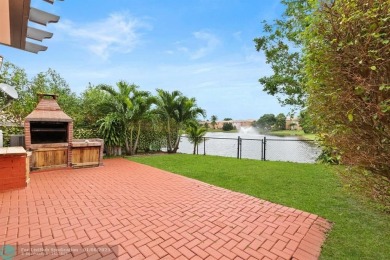 Spectacular LAKE VIEWS from this 4 bedroom 2.5 bath home located on Inverrary Country Club in Florida - for sale on GolfHomes.com, golf home, golf lot