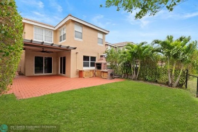 Spectacular LAKE VIEWS from this 4 bedroom 2.5 bath home located on Inverrary Country Club in Florida - for sale on GolfHomes.com, golf home, golf lot