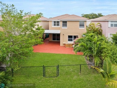 Spectacular LAKE VIEWS from this 4 bedroom 2.5 bath home located on Inverrary Country Club in Florida - for sale on GolfHomes.com, golf home, golf lot