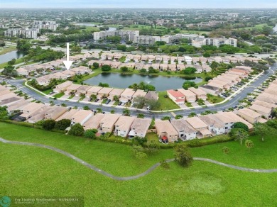 Spectacular LAKE VIEWS from this 4 bedroom 2.5 bath home located on Inverrary Country Club in Florida - for sale on GolfHomes.com, golf home, golf lot