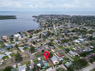 INVESTMENT OPPORTUNITY - Property was impacted by Hurricane on Mangrove Bay Golf Course in Florida - for sale on GolfHomes.com, golf home, golf lot