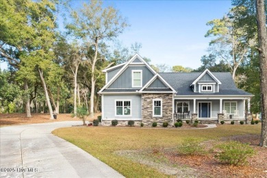 Rare opportunity to own an incredible, move-in ready on Oyster Bay Golf Links in North Carolina - for sale on GolfHomes.com, golf home, golf lot