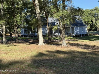 Rare opportunity to own an incredible, move-in ready on Oyster Bay Golf Links in North Carolina - for sale on GolfHomes.com, golf home, golf lot