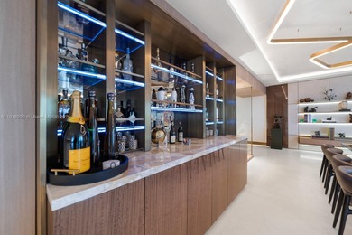 This elegantly designed 4-bedroom, 4.5-bath residence at Palazzo on Fisher Island Club in Florida - for sale on GolfHomes.com, golf home, golf lot