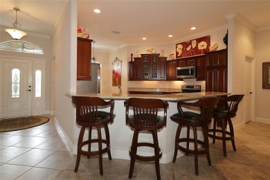 This beautiful Gardenia was custom built by the current owner on The Links of Spruce Creek in Florida - for sale on GolfHomes.com, golf home, golf lot