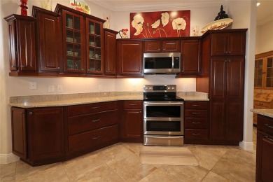 This beautiful Gardenia was custom built by the current owner on The Links of Spruce Creek in Florida - for sale on GolfHomes.com, golf home, golf lot