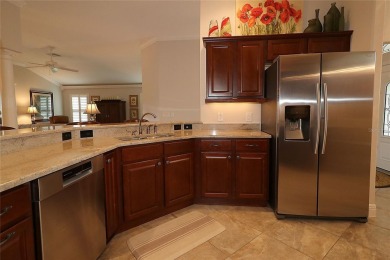This beautiful Gardenia was custom built by the current owner on The Links of Spruce Creek in Florida - for sale on GolfHomes.com, golf home, golf lot
